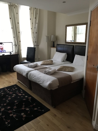 Imagen de la habitación del Hostal Sheil Suites. Foto 11