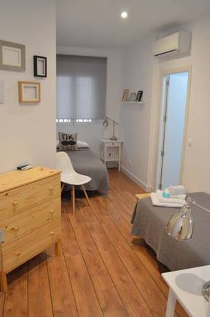 Imagen de la habitación del Hostal Smile & Co Hostal Boutique. Foto 10