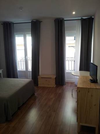 Imagen de la habitación del Hostal Smile & Co Hostal Boutique. Foto 12