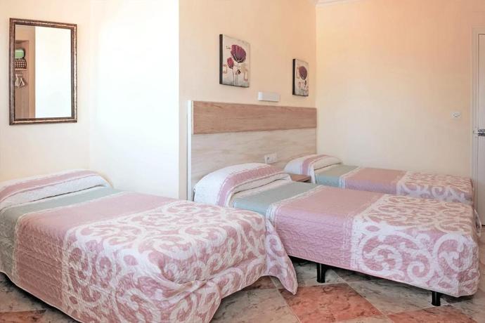 Imagen de la habitación del Hostal Sonrisa Del Mar. Foto 2