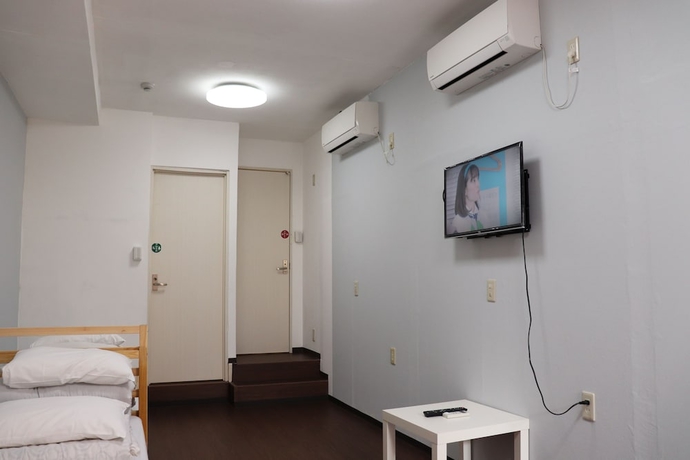 Imagen de la habitación del Hostal Sophiearth Apartment. Foto 11
