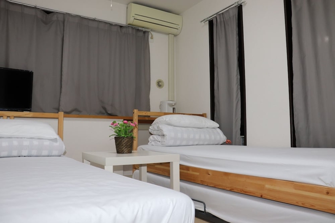 Imagen de la habitación del Hostal Sophiearth Apartment. Foto 13