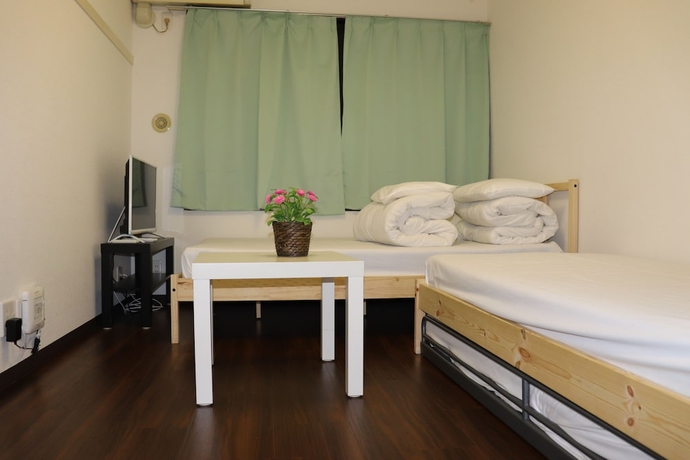 Imagen de la habitación del Hostal Sophiearth Apartment. Foto 14
