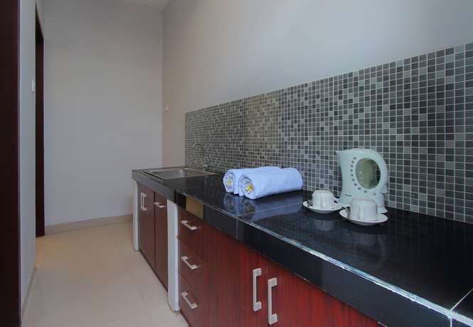 Imagen de la habitación del Hostal Sri Kandi Inn. Foto 5