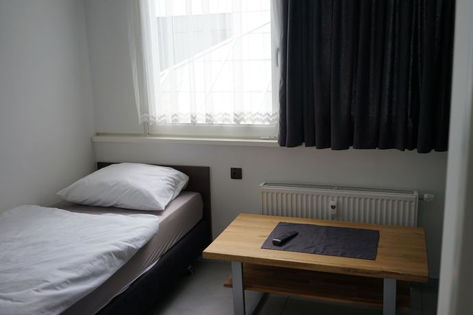 Imagen de la habitación del Hostal Stadtpension Heilbronn. Foto 3