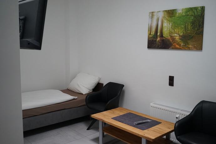 Imagen de la habitación del Hostal Stadtpension Heilbronn. Foto 8