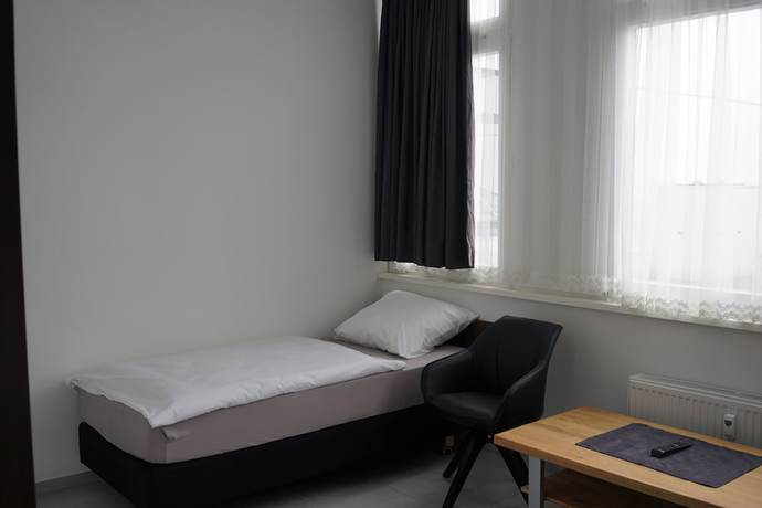 Imagen de la habitación del Hostal Stadtpension Heilbronn. Foto 10