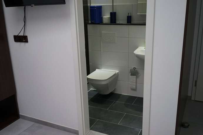 Imagen de la habitación del Hostal Stadtpension Heilbronn. Foto 11