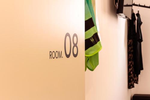 Imagen de la habitación del Hostal The 8 Rooms House. Foto 8