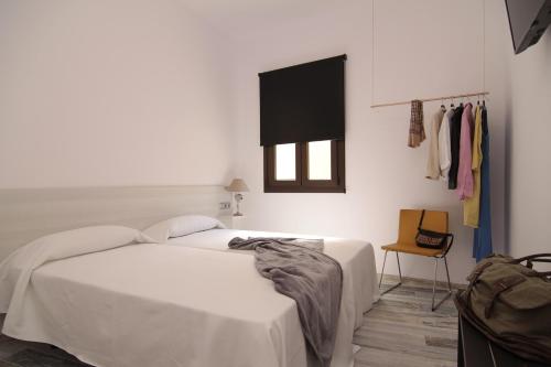 Imagen general del Hostal The 8 Rooms House. Foto 2