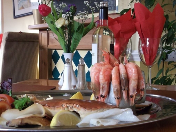 Imagen del bar/restaurante del Hostal The Highdown Inn. Foto 8