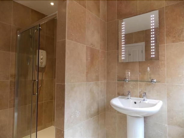 Imagen de la habitación del Hostal The Merrymoor. Foto 12