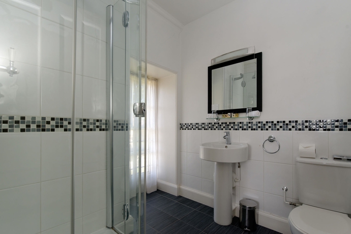 Imagen de la habitación del Hostal The Old Palace. Foto 10