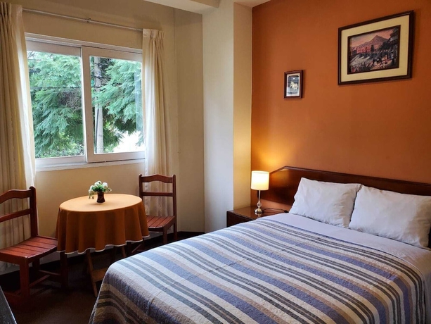 Imagen de la habitación del Hostal The Place Miraflores. Foto 8