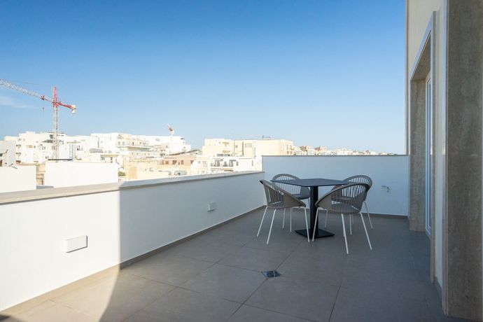 Imagen de la habitación del Hostal The Sliema Suites. Foto 19