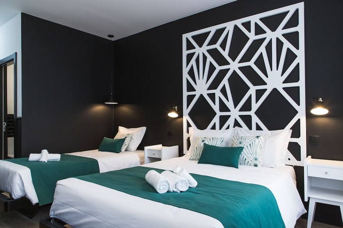 Imagen de la habitación del Hostal The Twenties Rooms and Suites. Foto 10