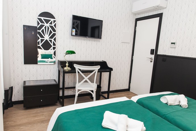 Imagen de la habitación del Hostal The Twenties Rooms and Suites. Foto 11