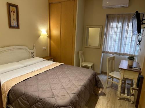 Imagen de la habitación del Hostal Toledo Plaza, Toledo. Foto 18