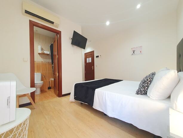 Imagen de la habitación del Hostal ToledoRooms Palacios. Foto 16