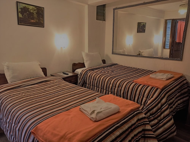 Imagen de la habitación del Hostal Tu Hogar. Foto 4