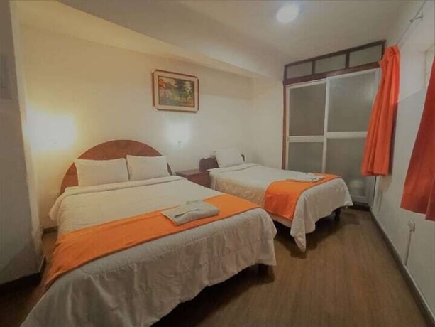 Imagen de la habitación del Hostal Tu Hogar. Foto 7