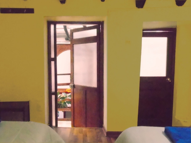Imagen de la habitación del Hostal Tu Hogar. Foto 12