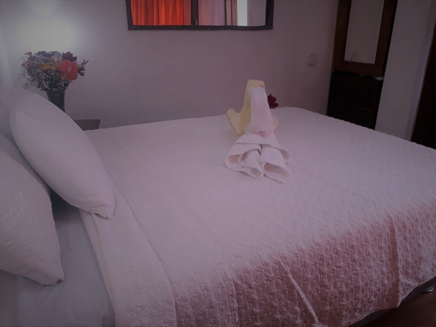 Imagen de la habitación del Hostal Tu Hogar. Foto 15