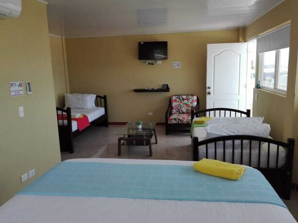 Imagen de la habitación del Hostal Victoria's Gennie Bay Village. Foto 5