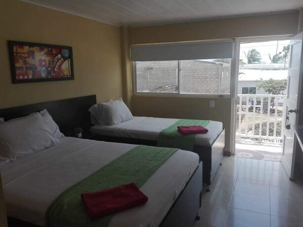 Imagen de la habitación del Hostal Victoria's Gennie Bay Village. Foto 9