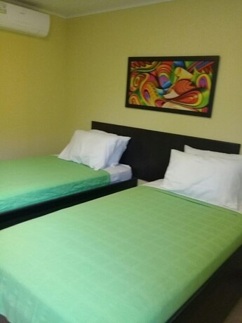 Imagen de la habitación del Hostal Victoria's Gennie Bay Village. Foto 14