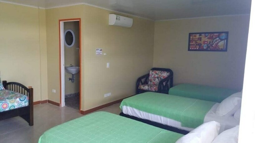 Imagen de la habitación del Hostal Victoria's Gennie Bay Village. Foto 16