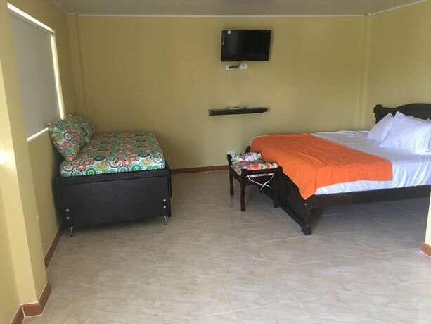 Imagen de la habitación del Hostal Victoria's Gennie Bay Village. Foto 17