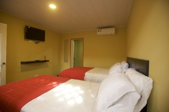 Imagen de la habitación del Hostal Victoria's Gennie Bay Village. Foto 18