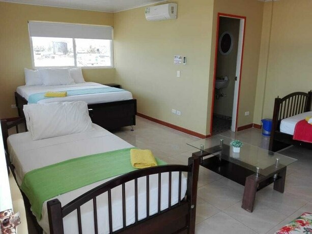 Imagen de la habitación del Hostal Victoria's Gennie Bay Village. Foto 19