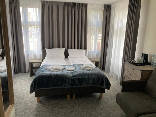 Imagen de la habitación del Hostal Villa Neos. Foto 3