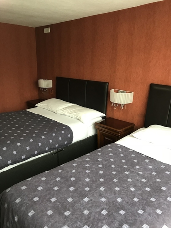 Imagen de la habitación del Hostal Warwick Lodge. Foto 13