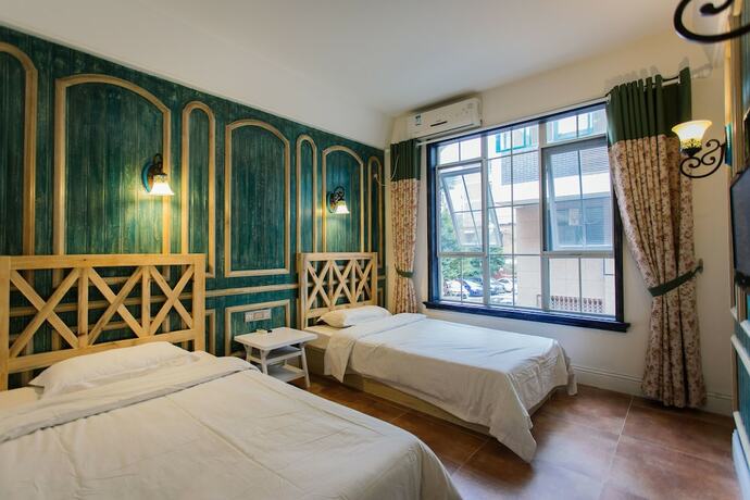 Imagen de la habitación del Hostel 7 Sages Bell Tower Boutique Youth. Foto 13