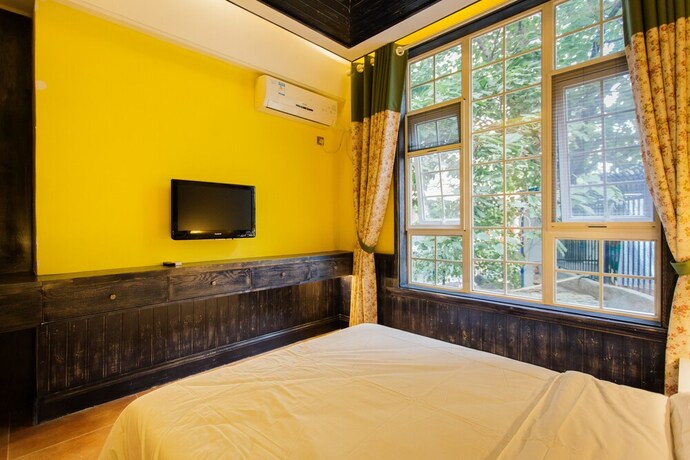 Imagen de la habitación del Hostel 7 Sages Bell Tower Boutique Youth. Foto 17