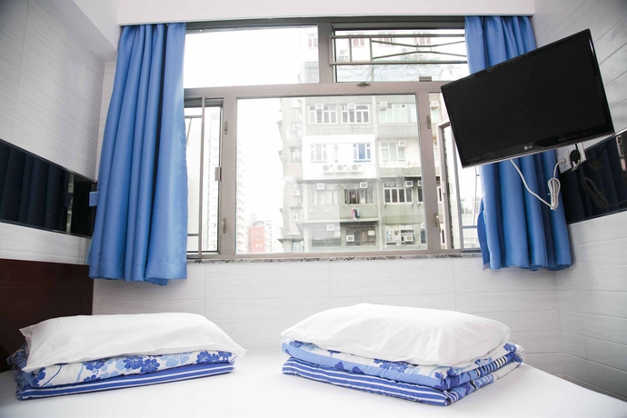 Imagen de la habitación del Hostel Ah Shan. Foto 4