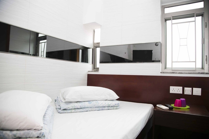 Imagen de la habitación del Hostel Ah Shan. Foto 11