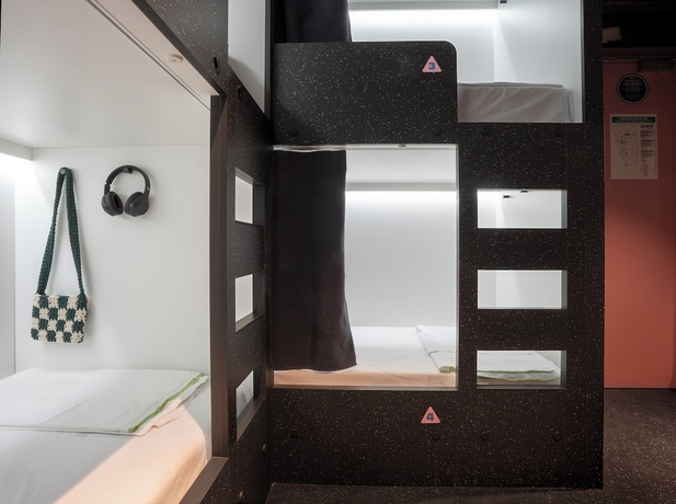 Imagen de la habitación del Hostel Amistat City Barcelona. Foto 10