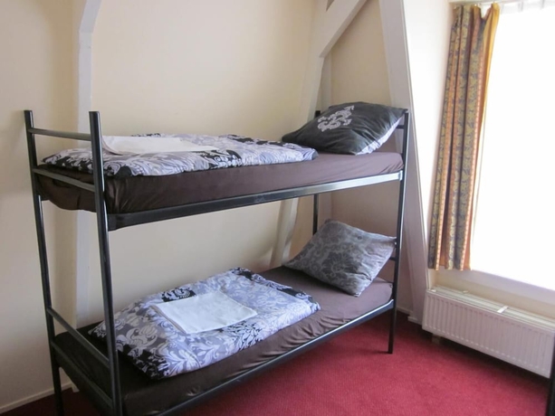 Imagen de la habitación del Hostel Amsterdam Uptown. Foto 11