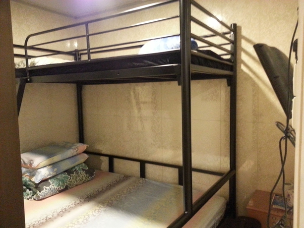 Imagen de la habitación del Hostel Apple Inn Mong Kok -. Foto 6