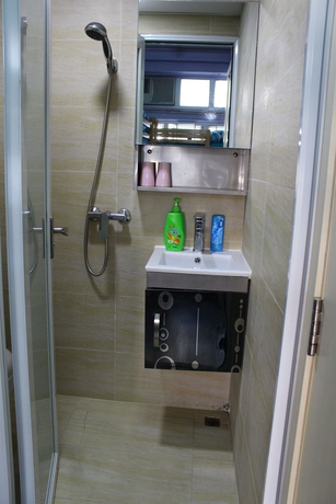 Imagen de la habitación del Hostel Apple Inn Mong Kok -. Foto 12