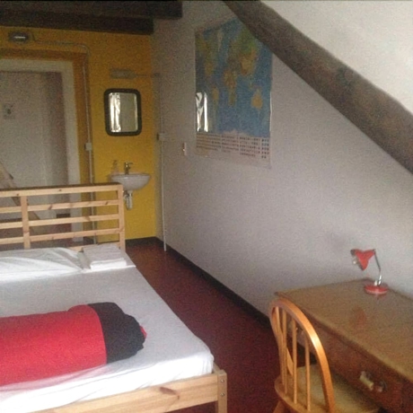 Imagen de la habitación del Hostel Attic Torino. Foto 15