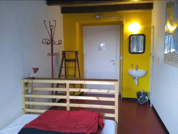 Imagen de la habitación del Hostel Attic Torino. Foto 16