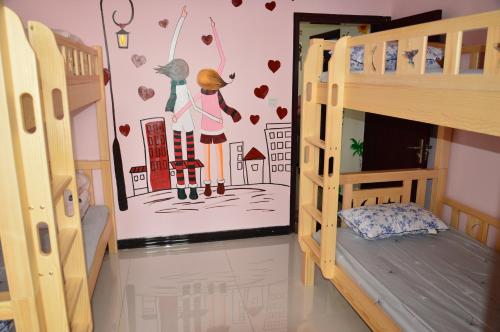 Imagen de la habitación del Hostel Baoji Red Tour International. Foto 7