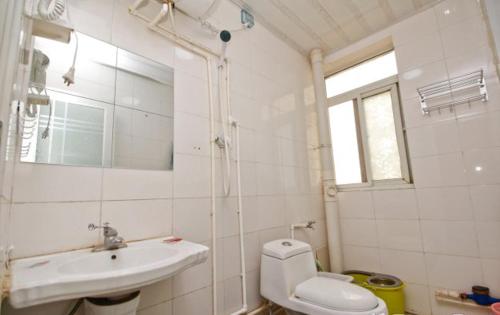 Imagen de la habitación del Hostel Baoji Red Tour International. Foto 9