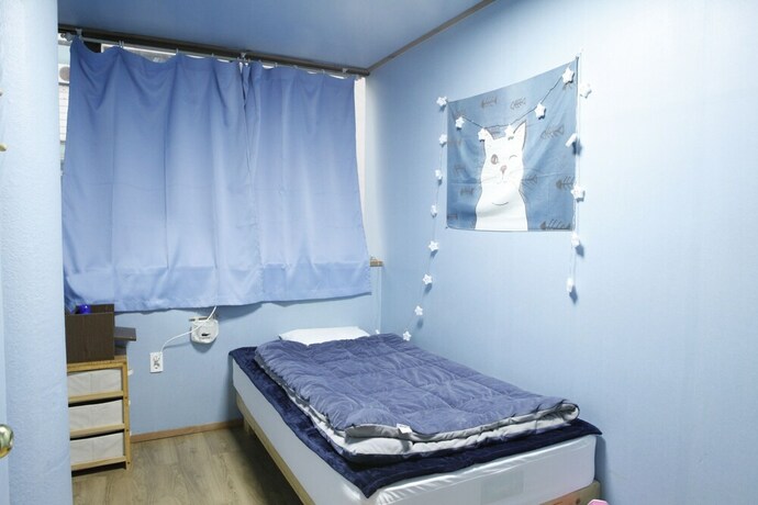Imagen de la habitación del Hostel Baozen Guesthouse -. Foto 22