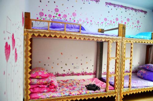 Imagen de la habitación del Hostel Blue Sky, fenghuang. Foto 5